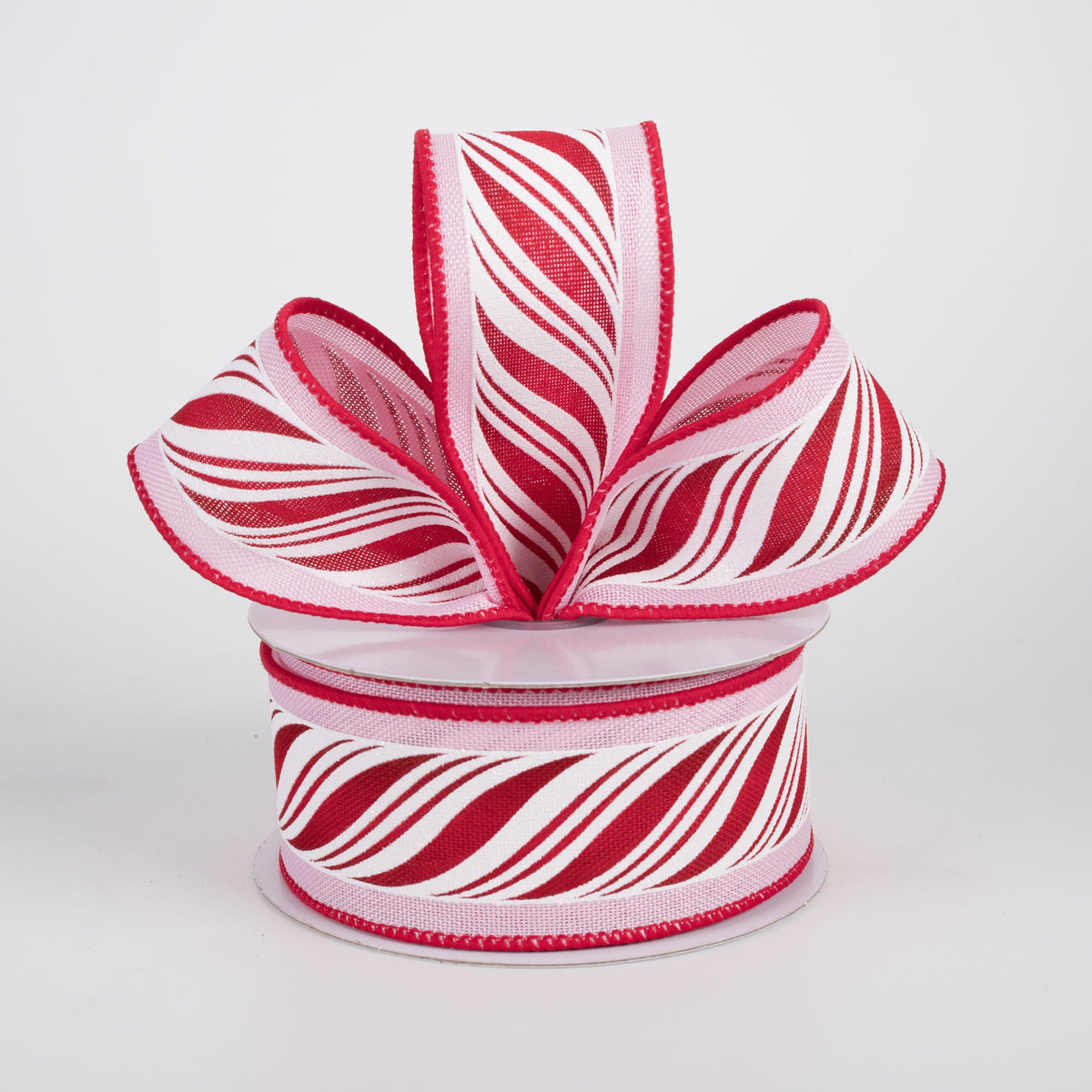 1.5" Peppermint Candy Cane Twist Ribbon: Red & White on Pink (10 Yards) Lifestyle Photo