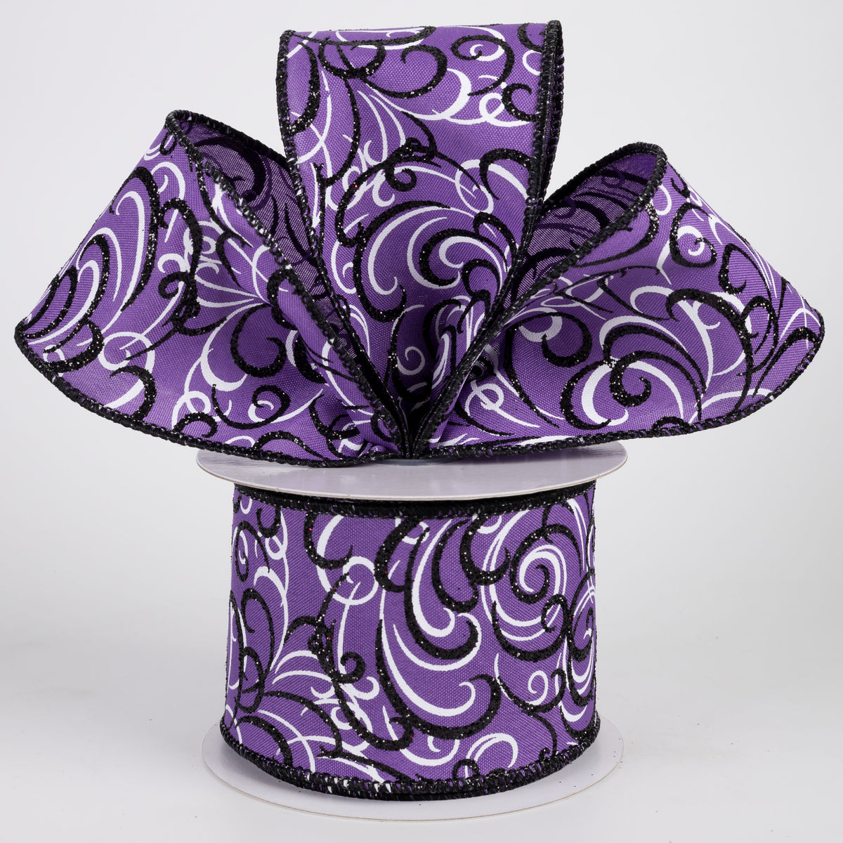 2.5" Glittered Multi Swirls Ribbon: Black & White on Purple (10 Yards) Lifestyle Photo