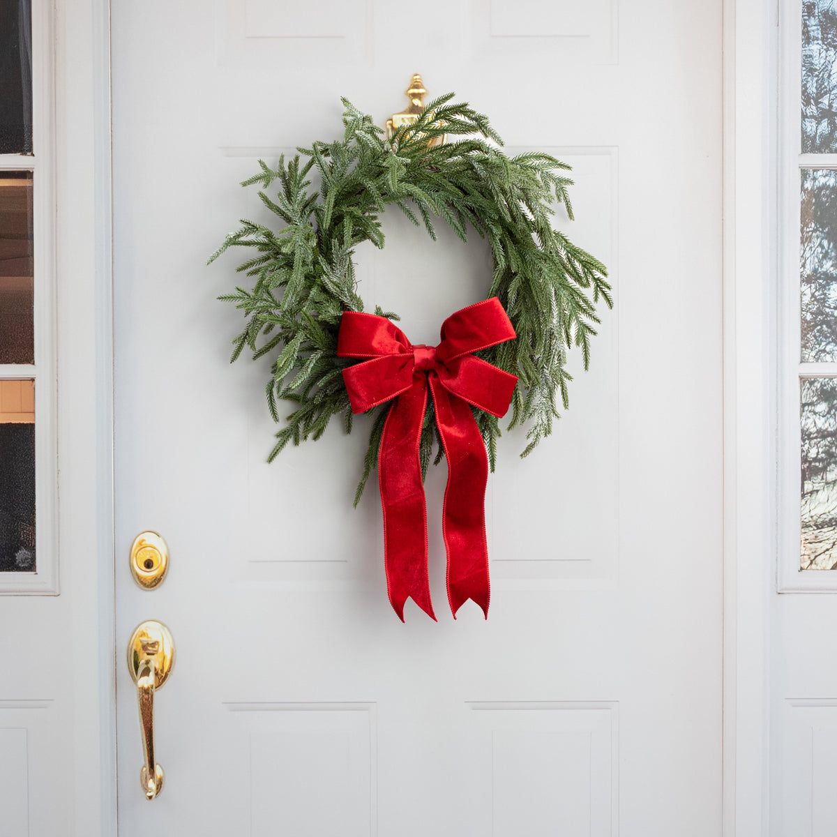 22" Soft Touch Glittered Frost Norfolk Pine Wreath Lifestyle Photo