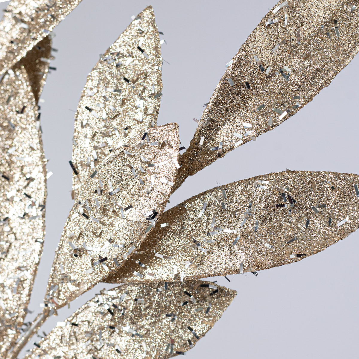 23" Tinsel Glitter Bay Leaf Spray: Champagne Gold & Silver Lifestyle Photo