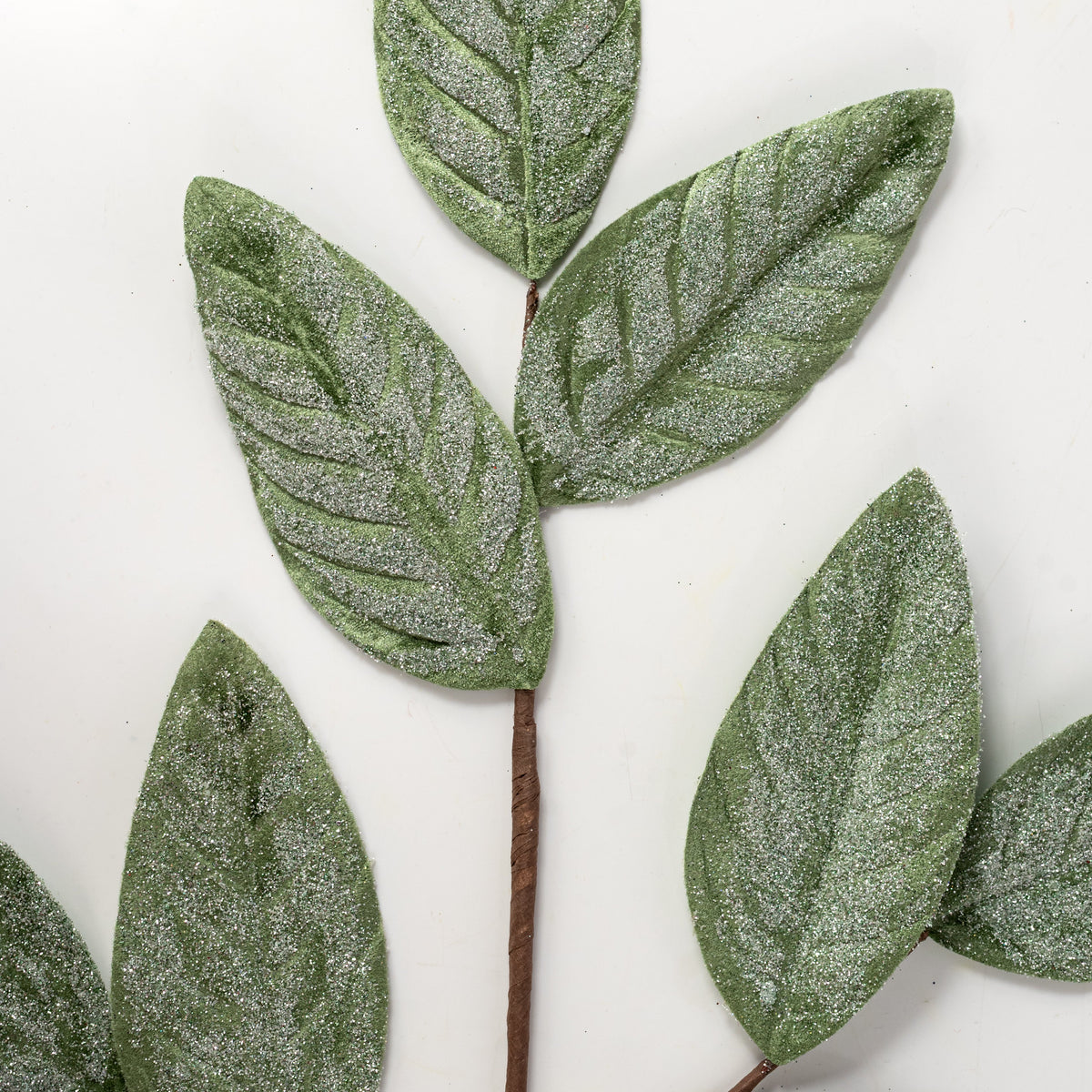 28" Sparkle Magnolia Leaves Spray: Sage Green Lifestyle Photo