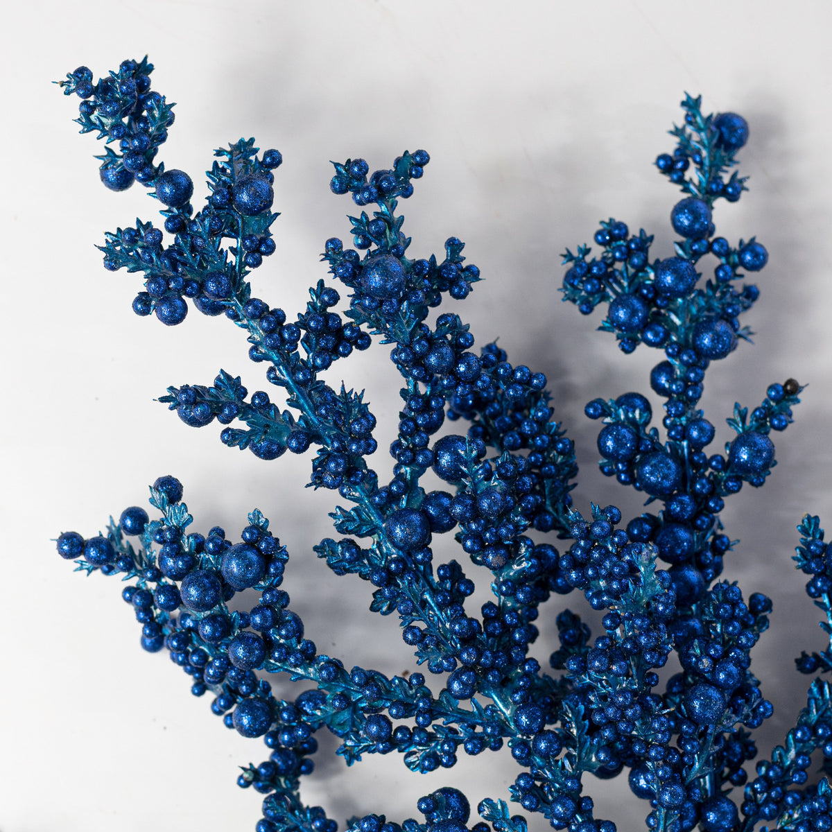 29" Glitter Mixed Berry & Cedar Spray: Royal Blue Lifestyle Photo