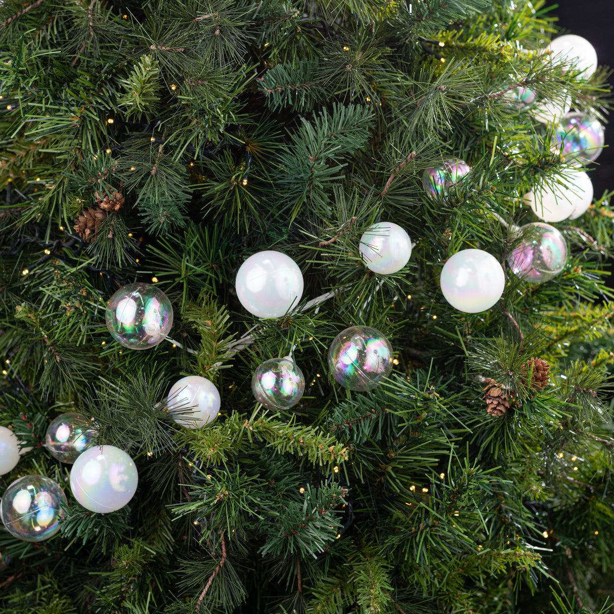 65" Ball Ornament Garland: Pearl White & Iridescent Clear Lifestyle Photo
