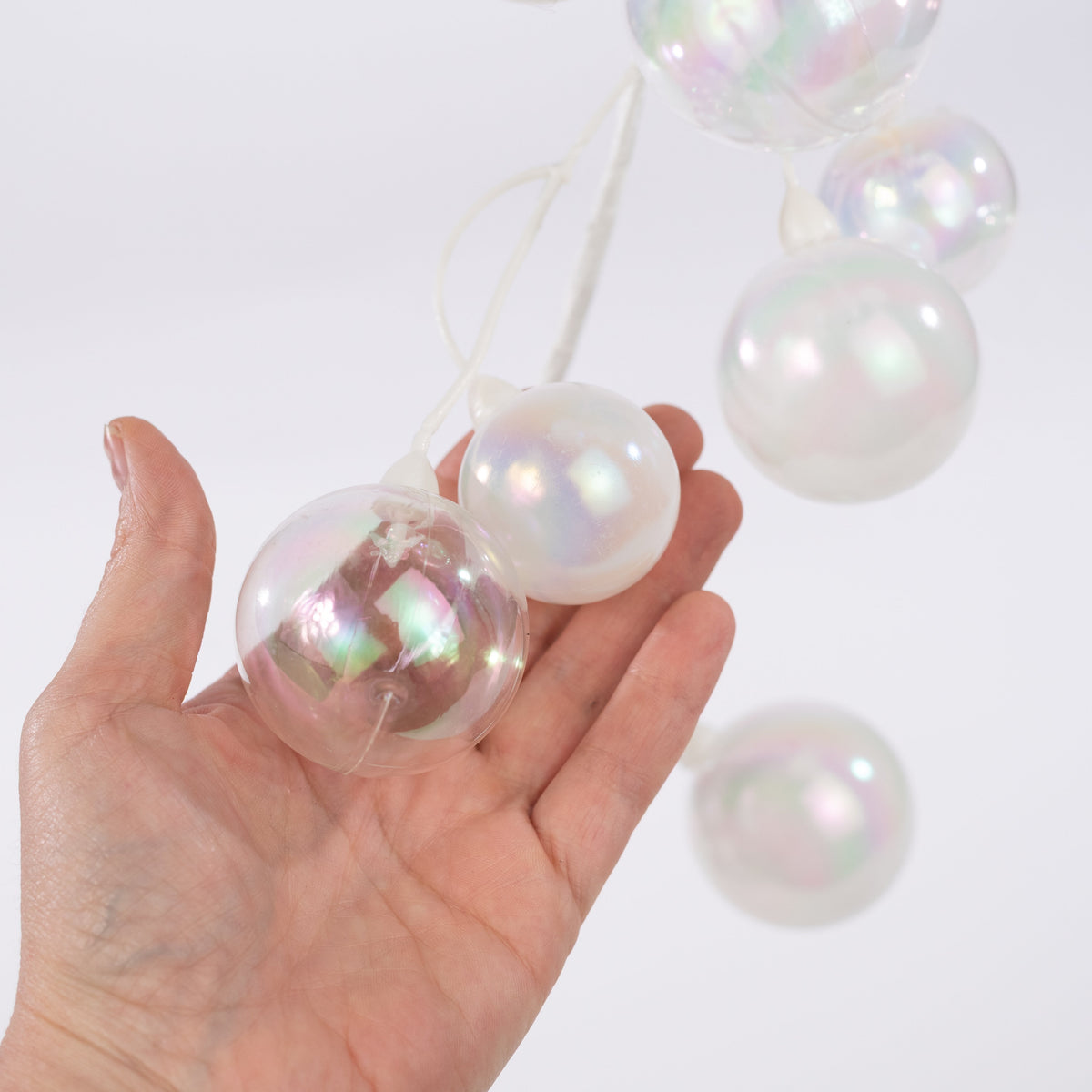 65" Ball Ornament Garland: Pearl White & Iridescent Clear detail photo 3