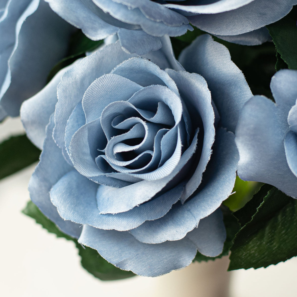 17" Colorfast Lillian Open Rose Bush: Dusty Blue (12) Lifestyle Photo