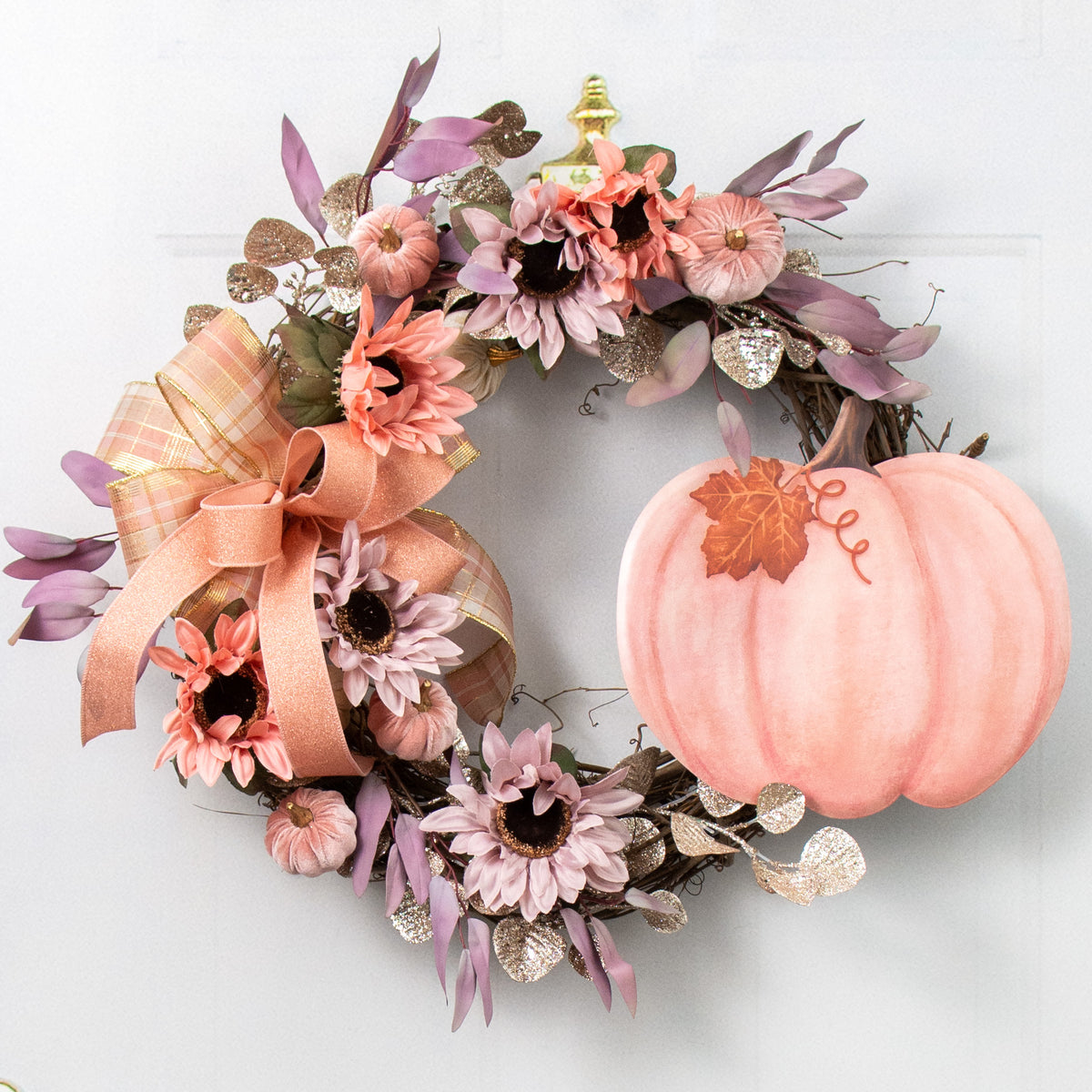 12" Embossed Metal Pumpkin Hanger: Dusty Rose Lifestyle Photo