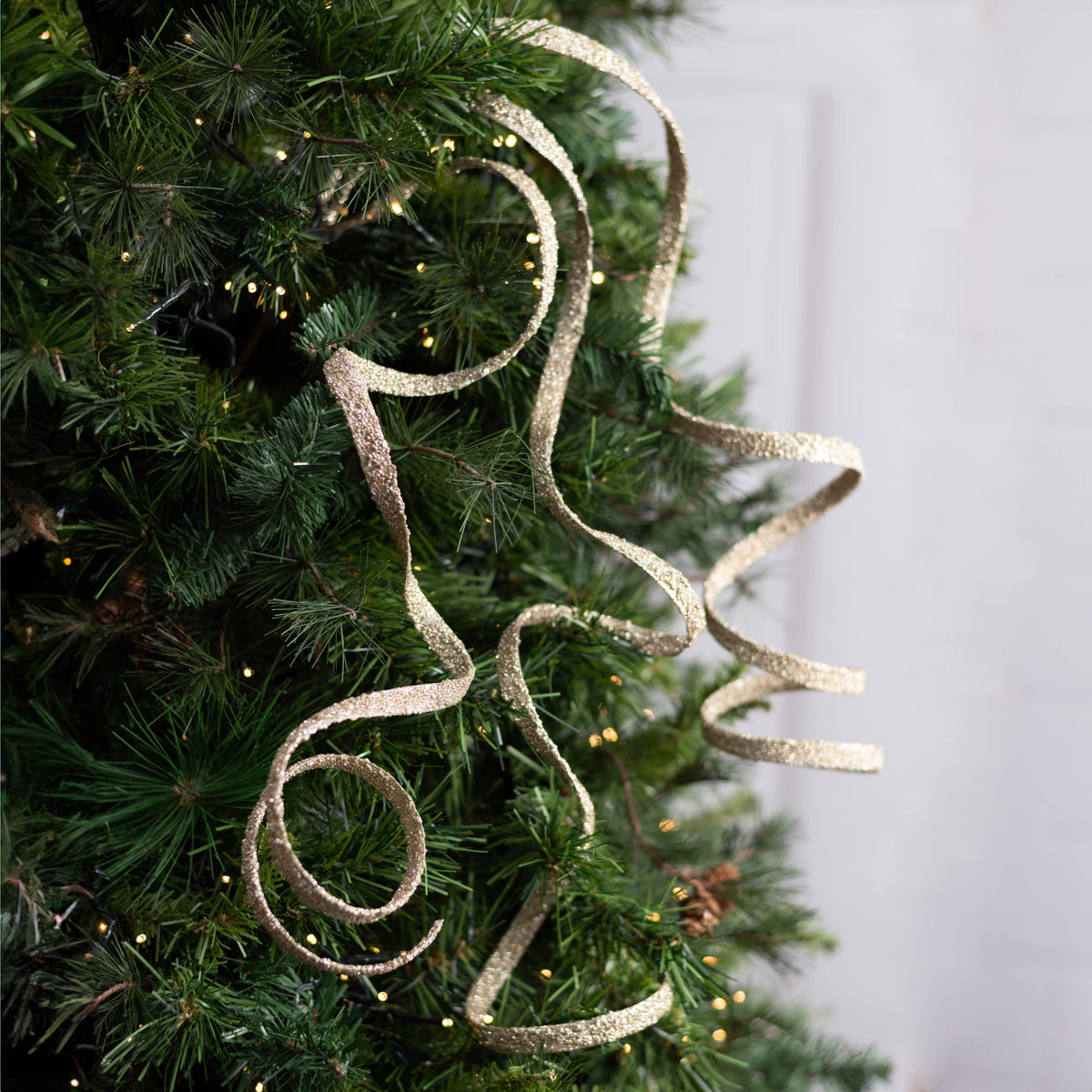 41" Curly Glitter Ribbon Spray: Champagne Gold
