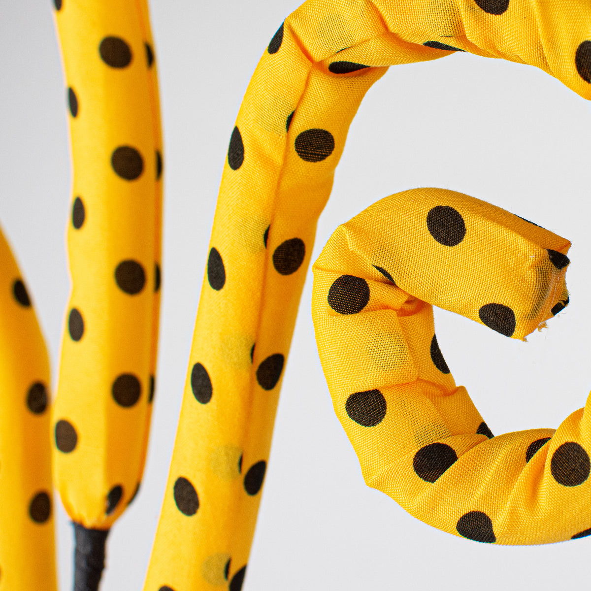30" Fabric Polkadot Curly Spray: Yellow & Black Lifestyle Photo