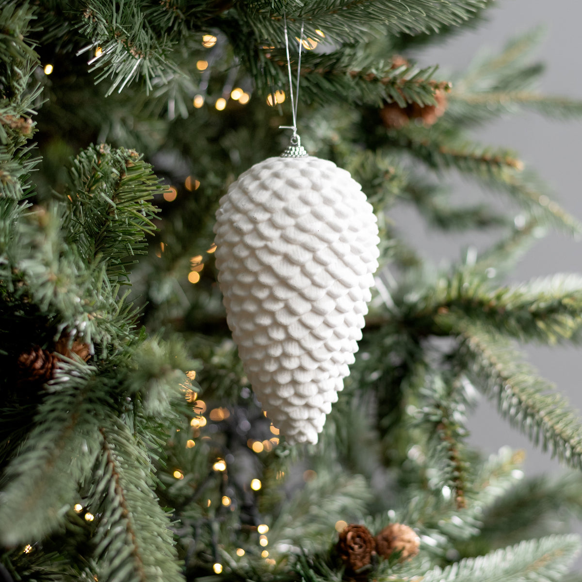 6" Flocked Pinecone Ornament: White Lifestyle Photo