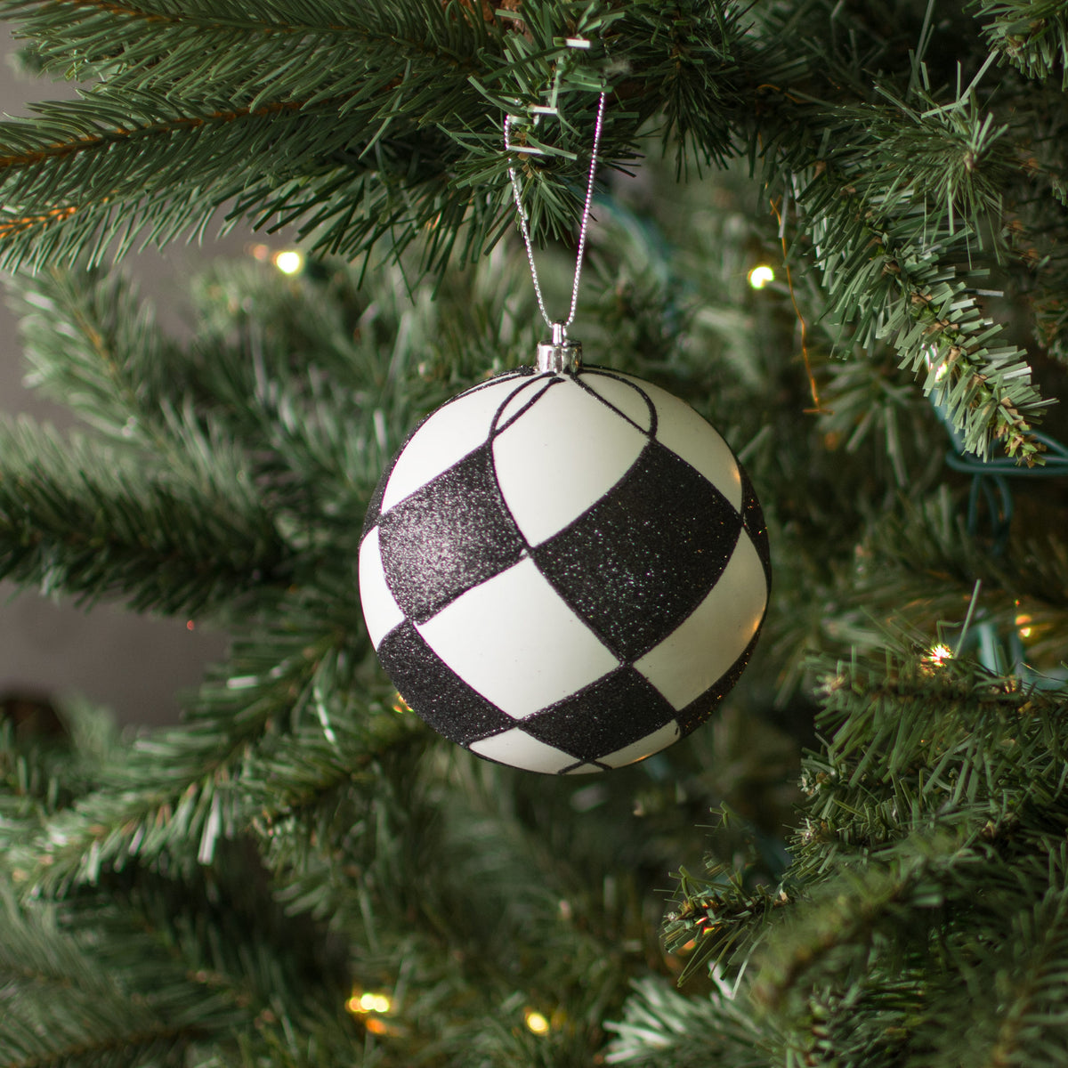 4" Glitter Harlequin Ball Ornament: Black & White Lifestyle Photo
