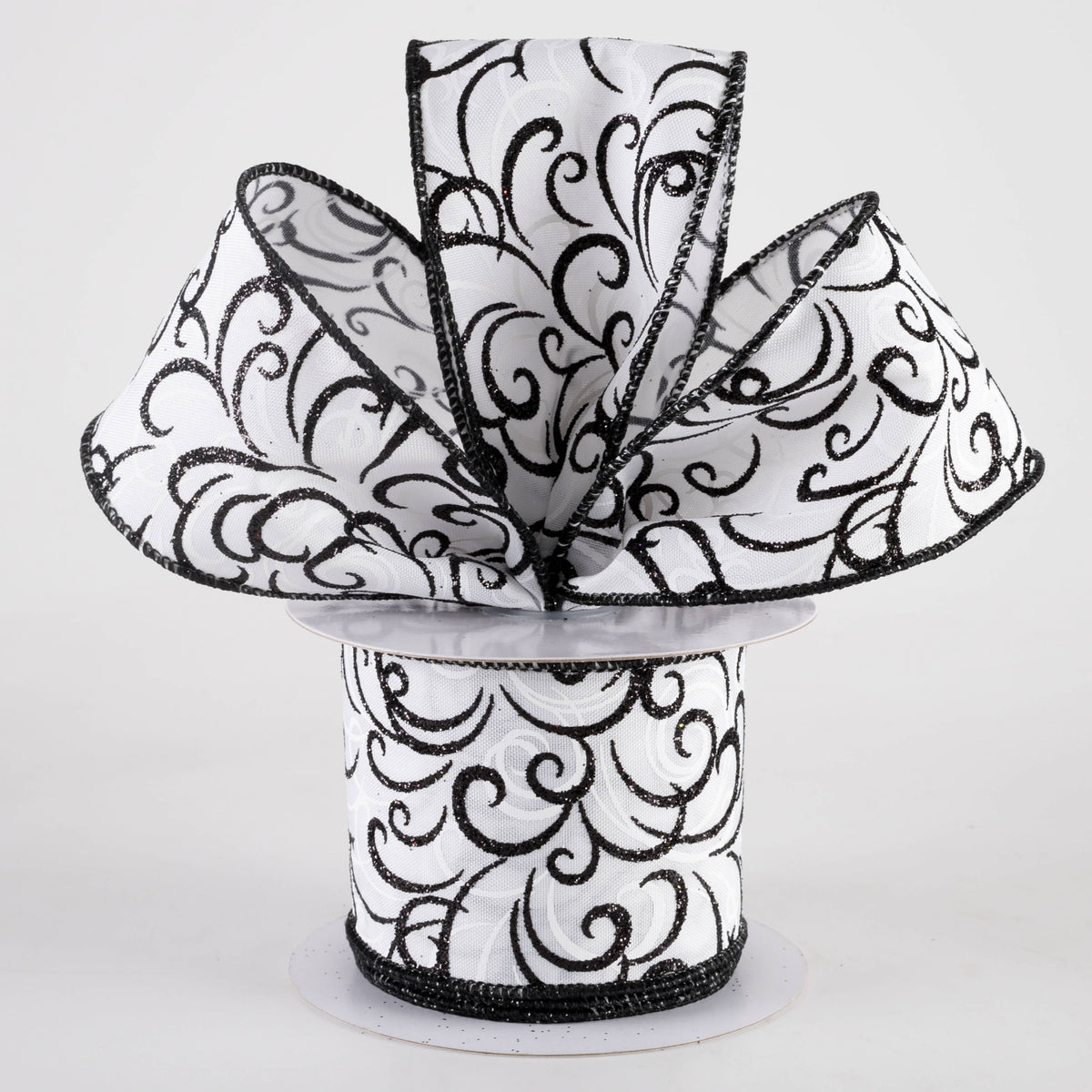 2.5" Glittered Multi Swirls Ribbon: Black on White (10 Yards) Lifestyle Photo