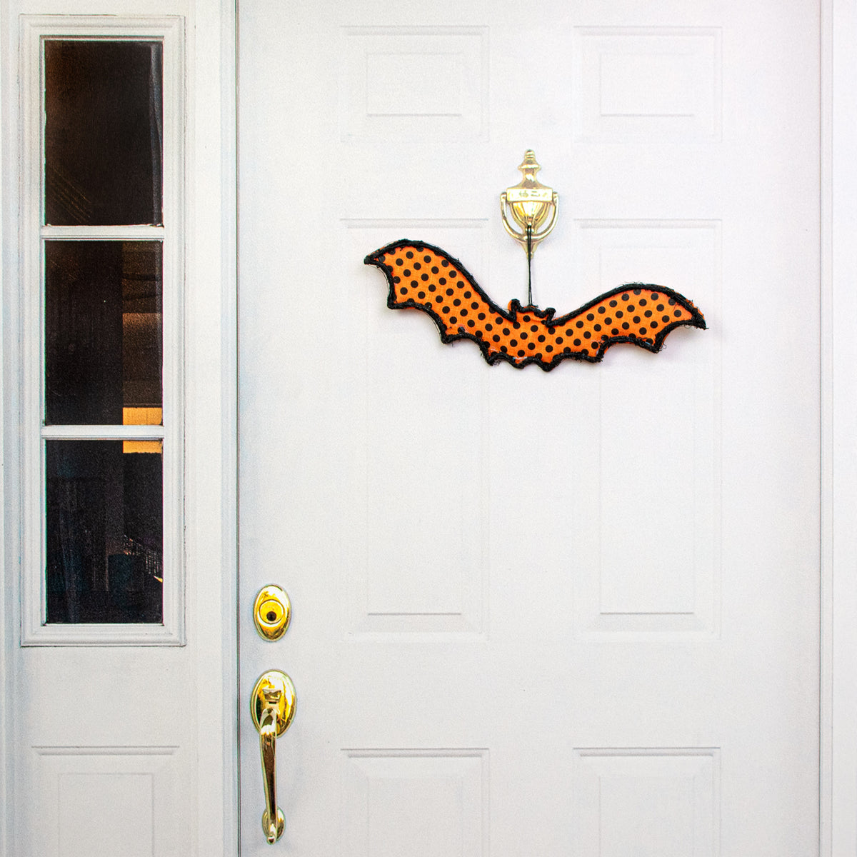 21" Grapevine Hanger: Orange Polka Dot Bat Lifestyle Photo