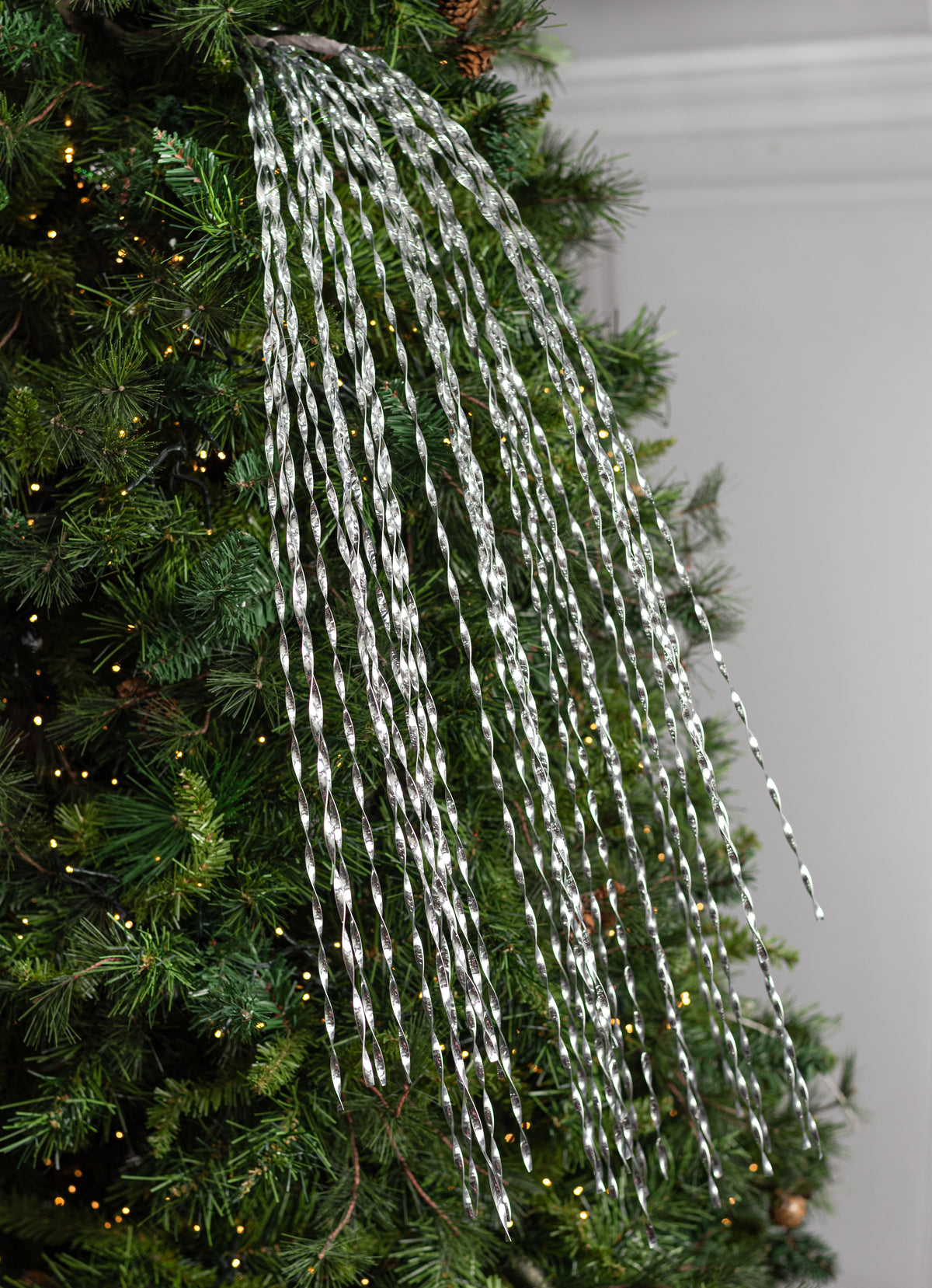 50" Spiraling Hanging Tinsel Spray: Metallic Silver