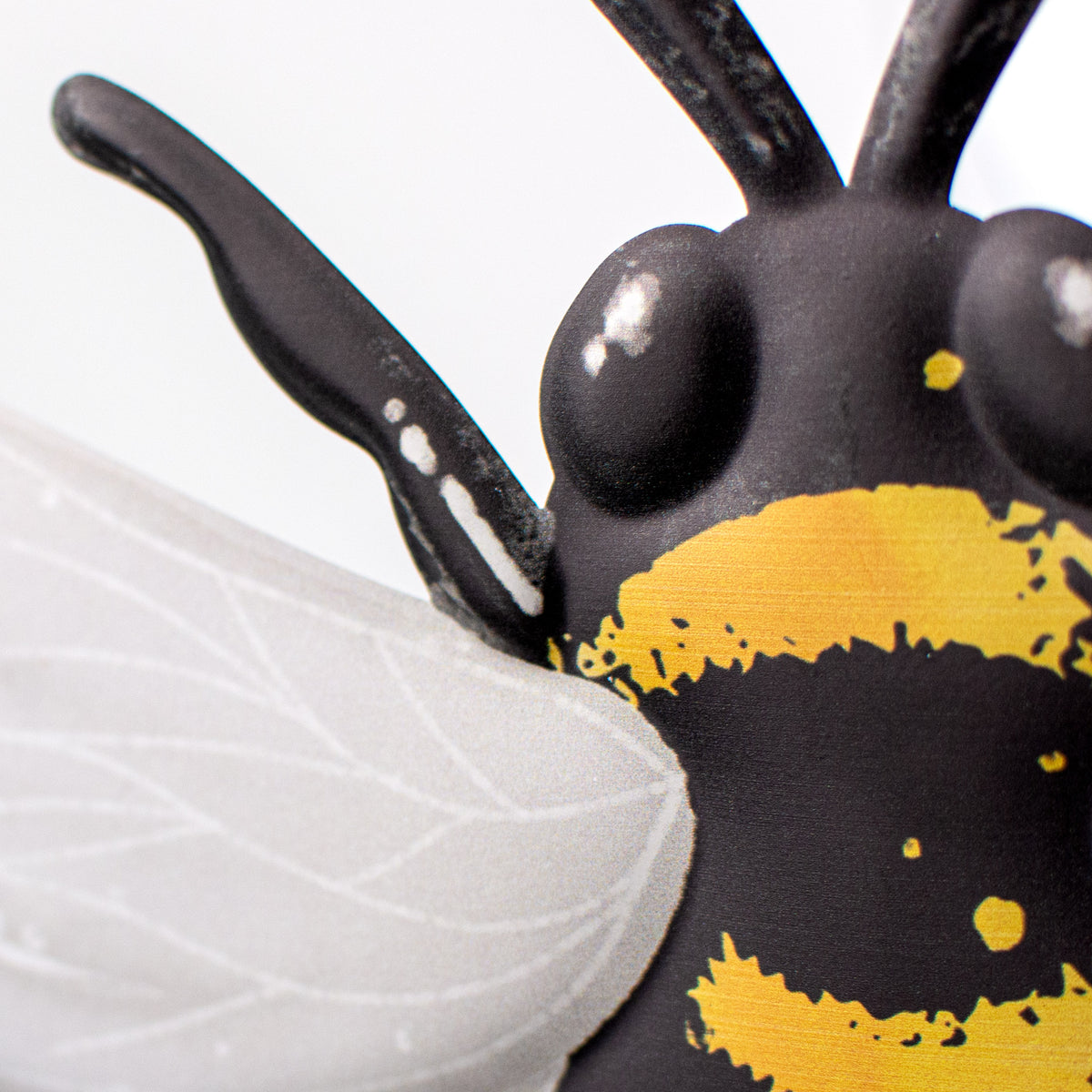 12" Metal Embossed Hanger: Bee detail photo 3