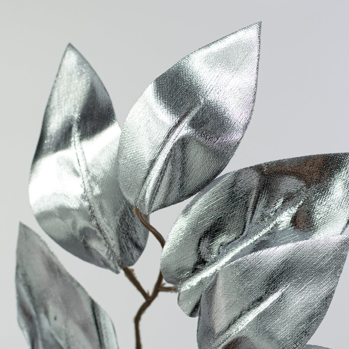 23" Metallic Ficus Leaf Spray: Silver (12) Lifestyle Photo