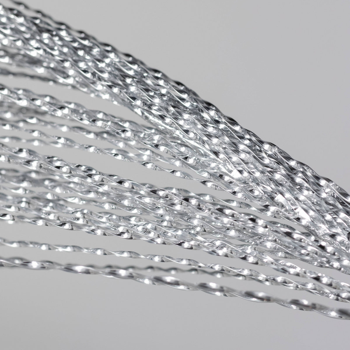 32" Metallic Twisted Grass Spray: Silver Lifestyle Photo