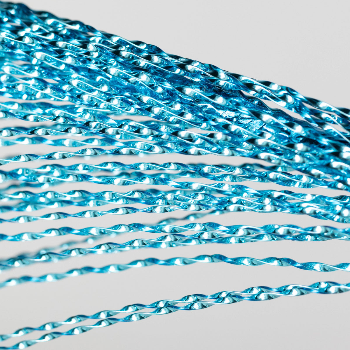 32" Metallic Twisted Grass Spray: Turquoise Blue Lifestyle Photo