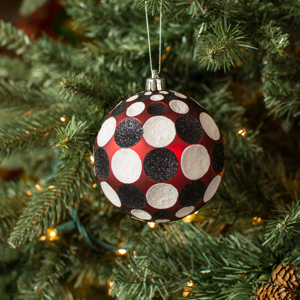 100MM Indent Dot Ball Ornament: Red, White, Black Lifestyle Photo