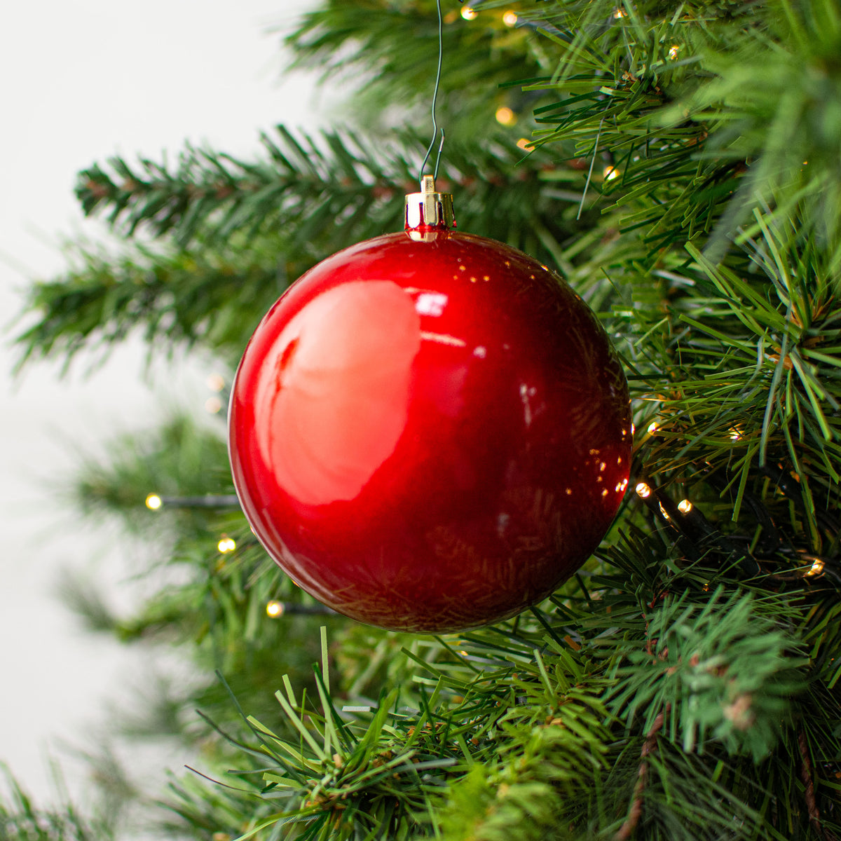 100MM Plastic Ball Ornament: Candy Apple Red (Set of 4) Lifestyle Photo