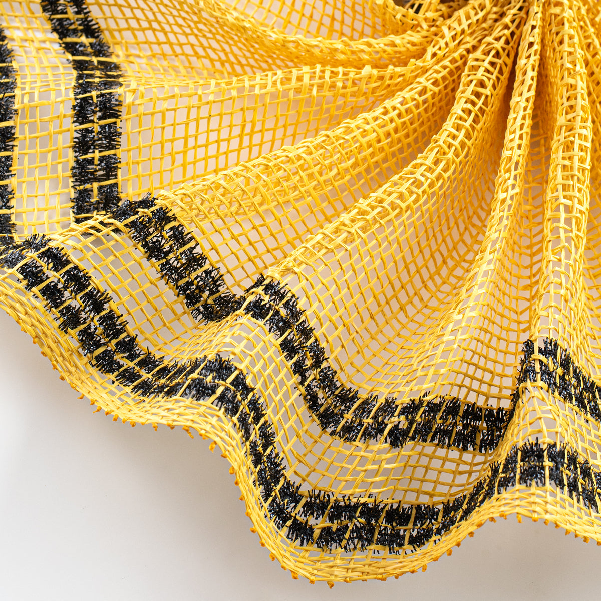 10" Poly Burlap Tinsel Border Mesh: Yellow & Black Lifestyle Photo