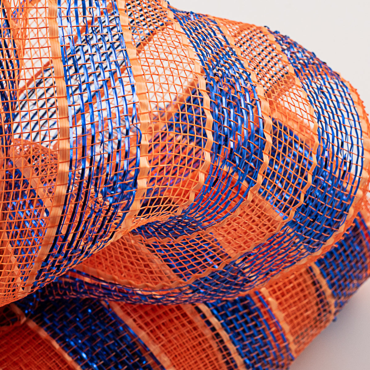10" Poly Deco Mesh: Metallic Orange/Blue Stripe Lifestyle Photo
