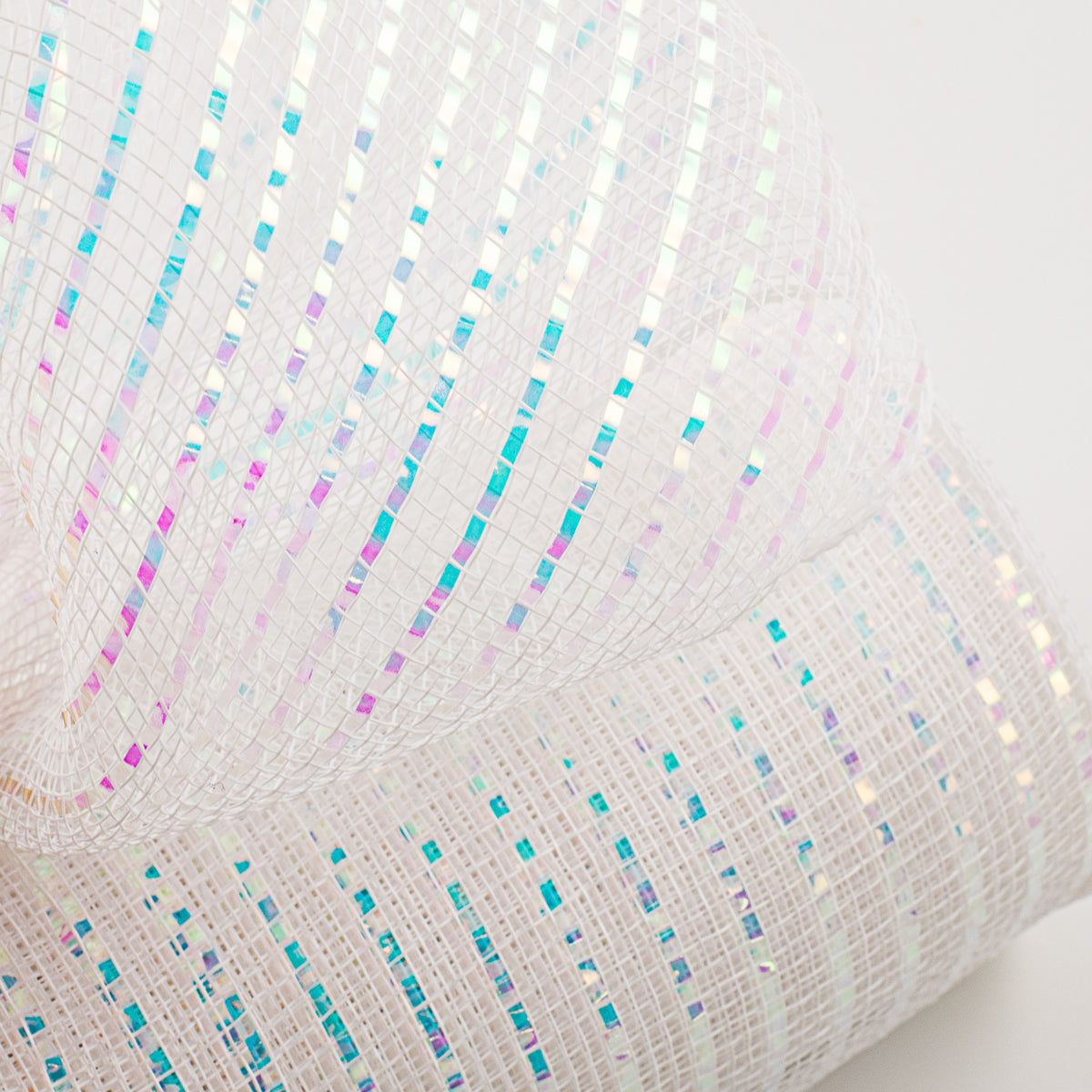 10" Poly Deco Mesh: Wide Foil Iridescent White Lifestyle Photo