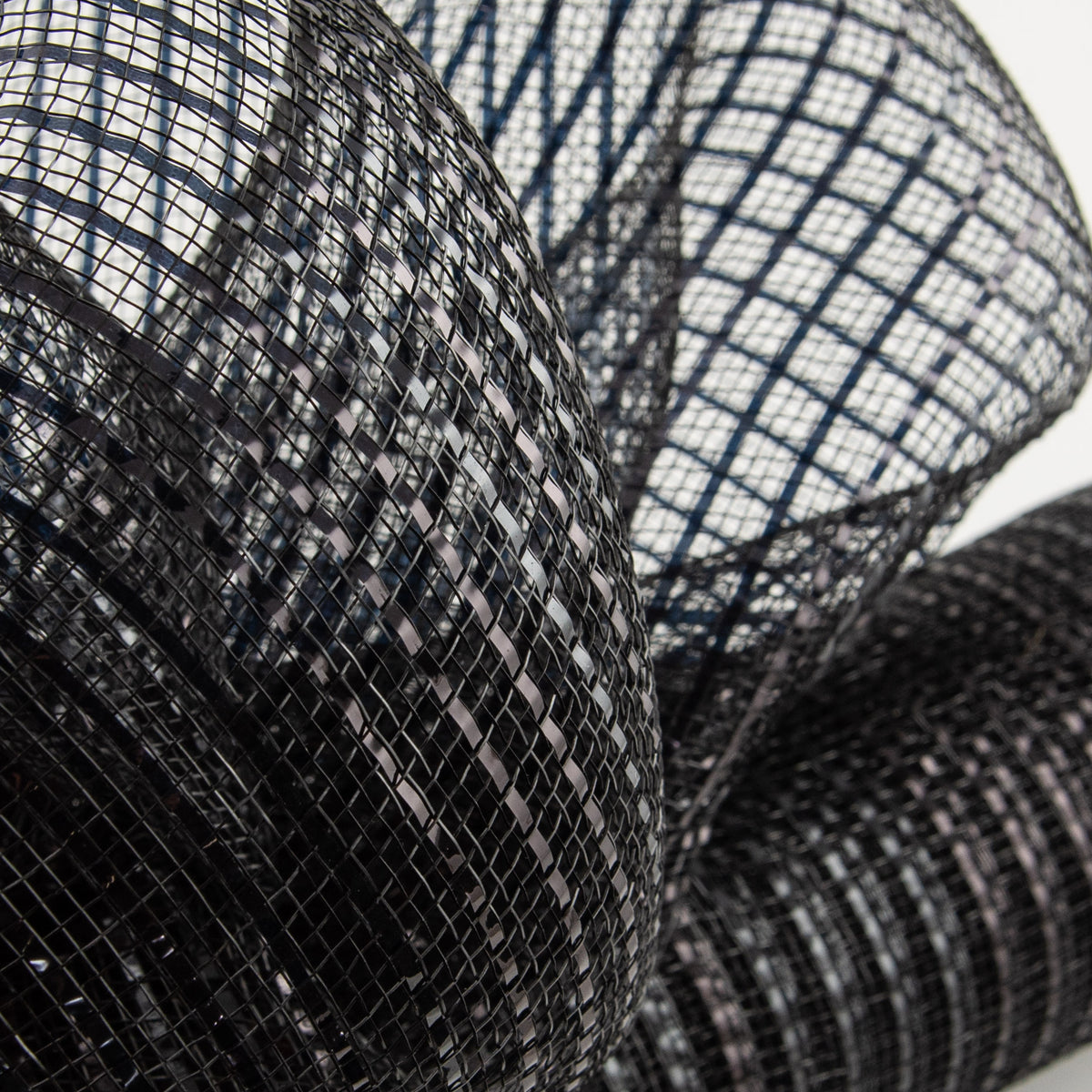 21" Poly Deco Mesh: Wide Foil Metallic Black Lifestyle Photo