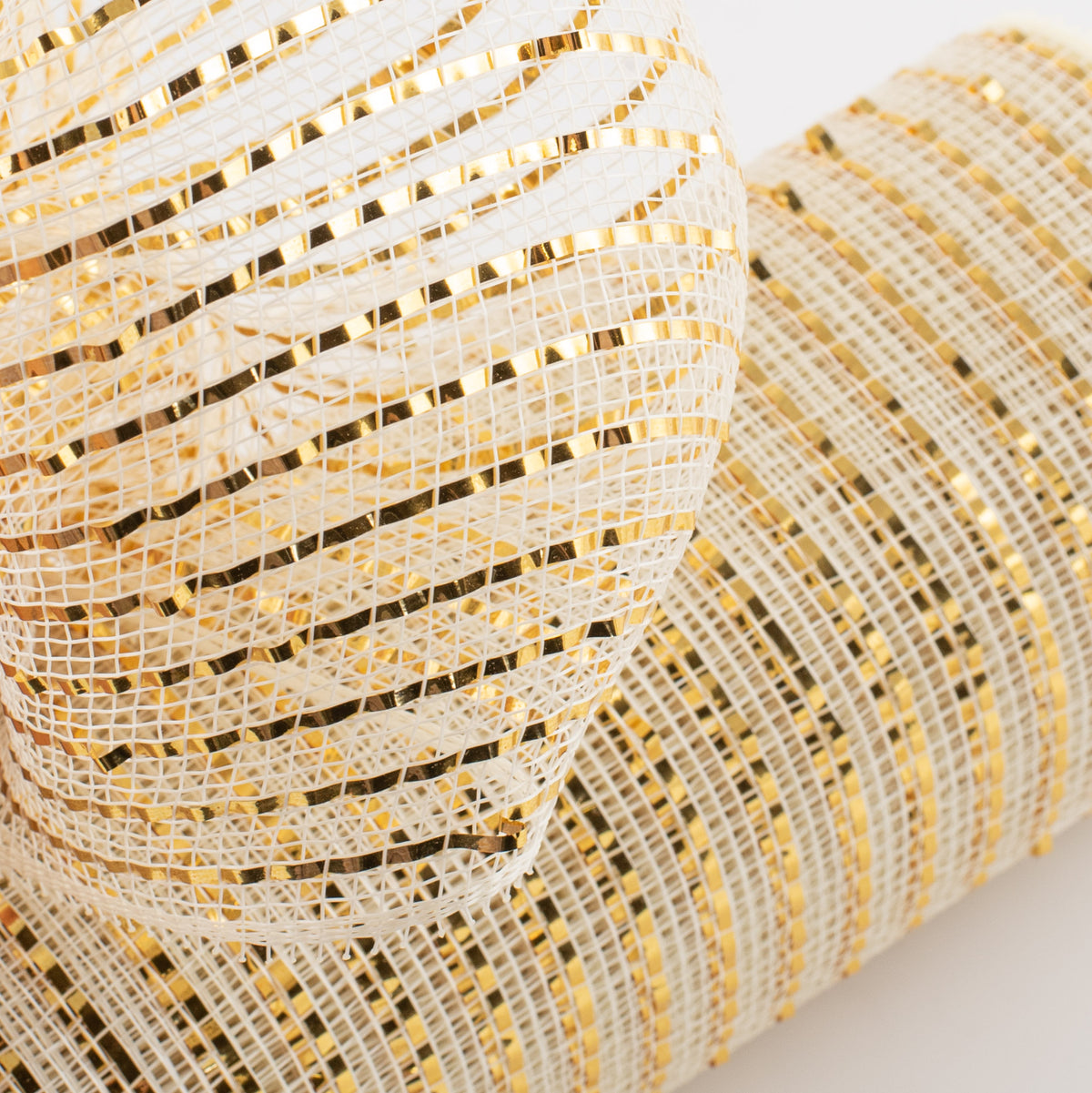10" Poly Deco Mesh: Wide Foil Metallic Gold With Cream Lifestyle Photo