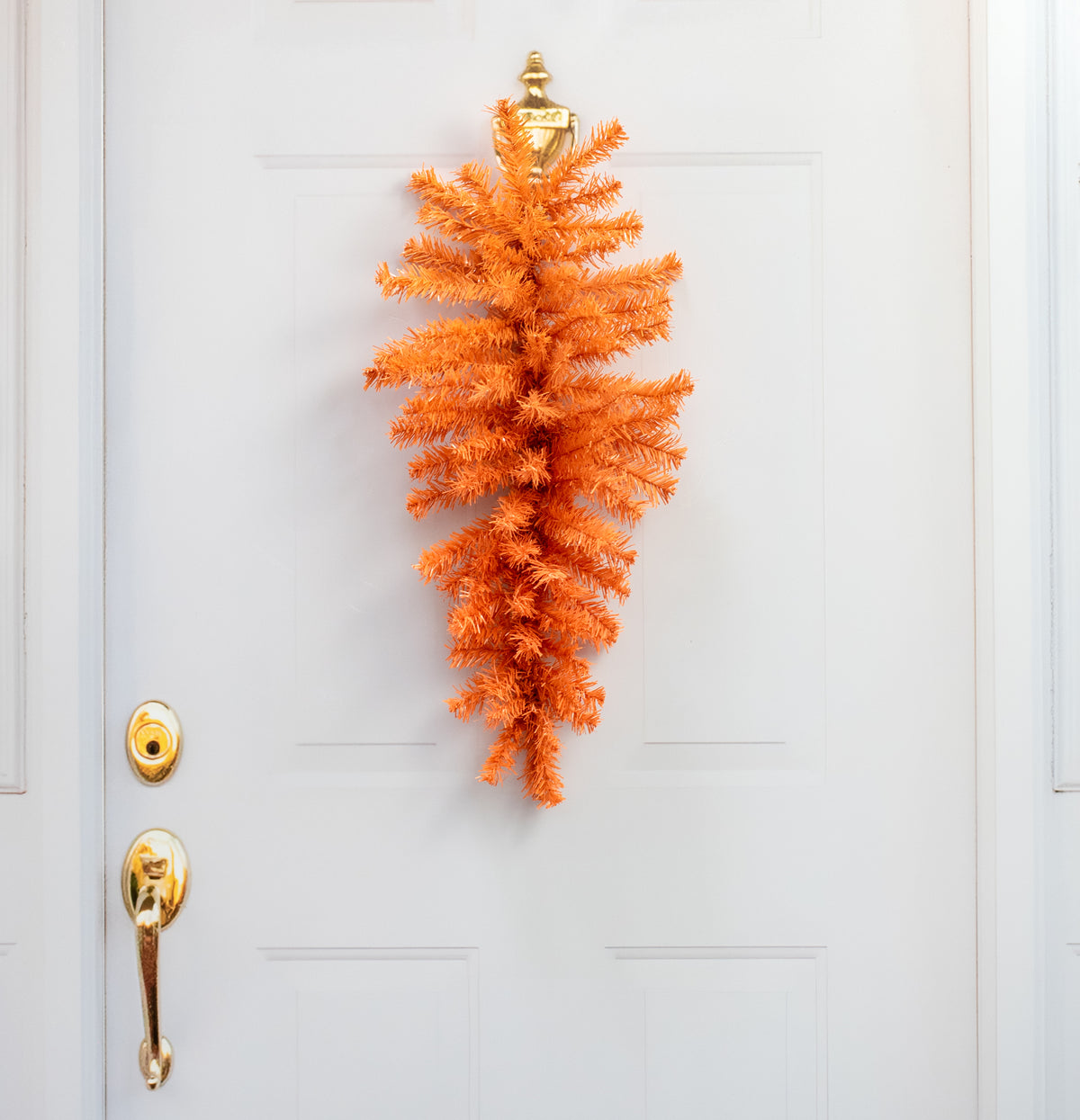 24" PVC Pine Teardrop Swag: Orange Lifestyle Photo