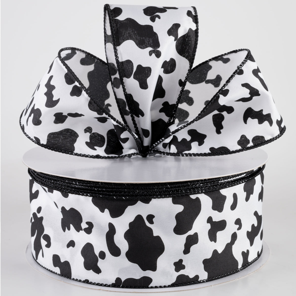 2.5" Satin Cow Print Ribbon: Black & White (50 Yards) Lifestyle Photo