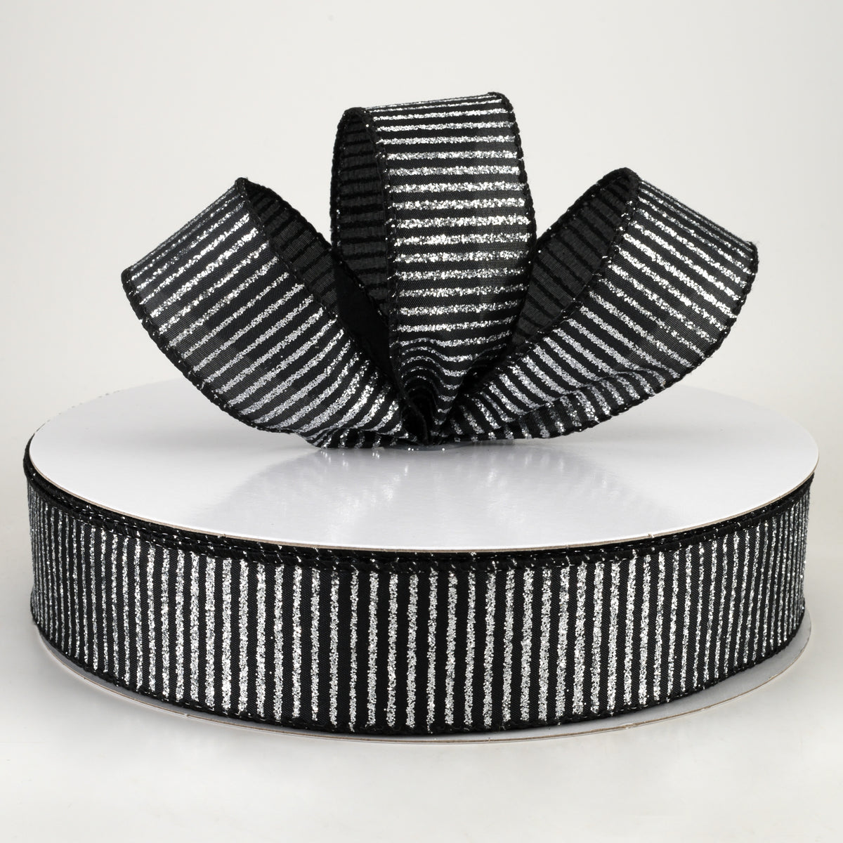 1.5" Satin Horizontal Glitter Stripe Ribbon: Silver on Black (50 Yards) Lifestyle Photo