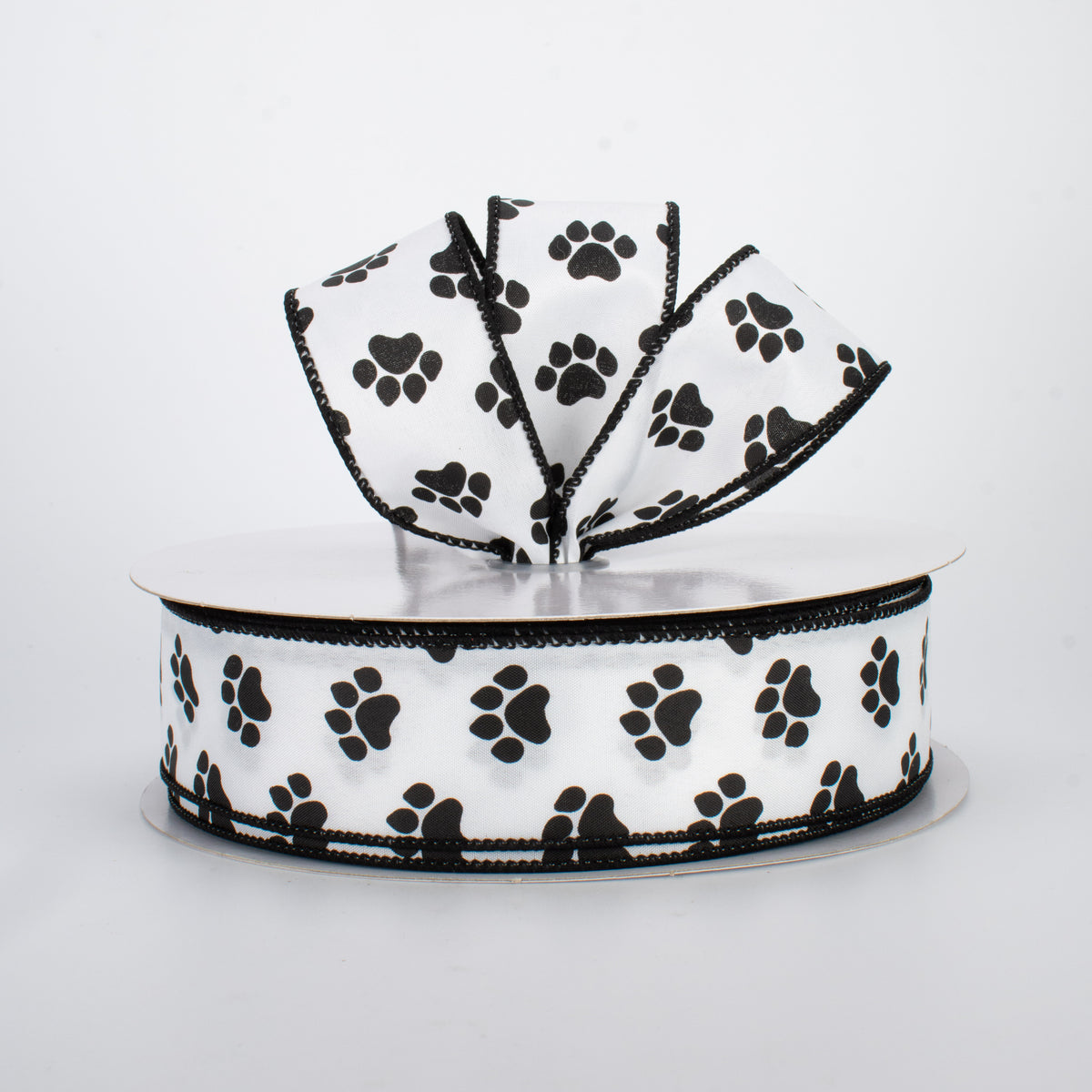 1.5" Satin Paw Print Ribbon: Black & White (50 Yards) Lifestyle Photo