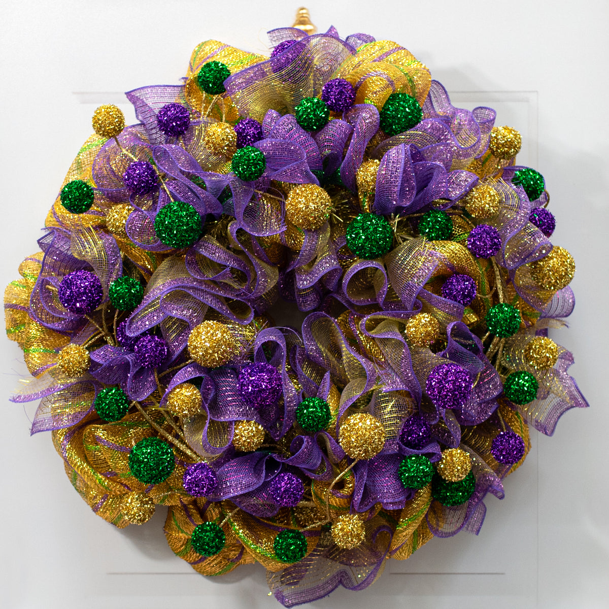 64" V-Cut Foil Ball Garland: Mardi Gras Lifestyle Photo
