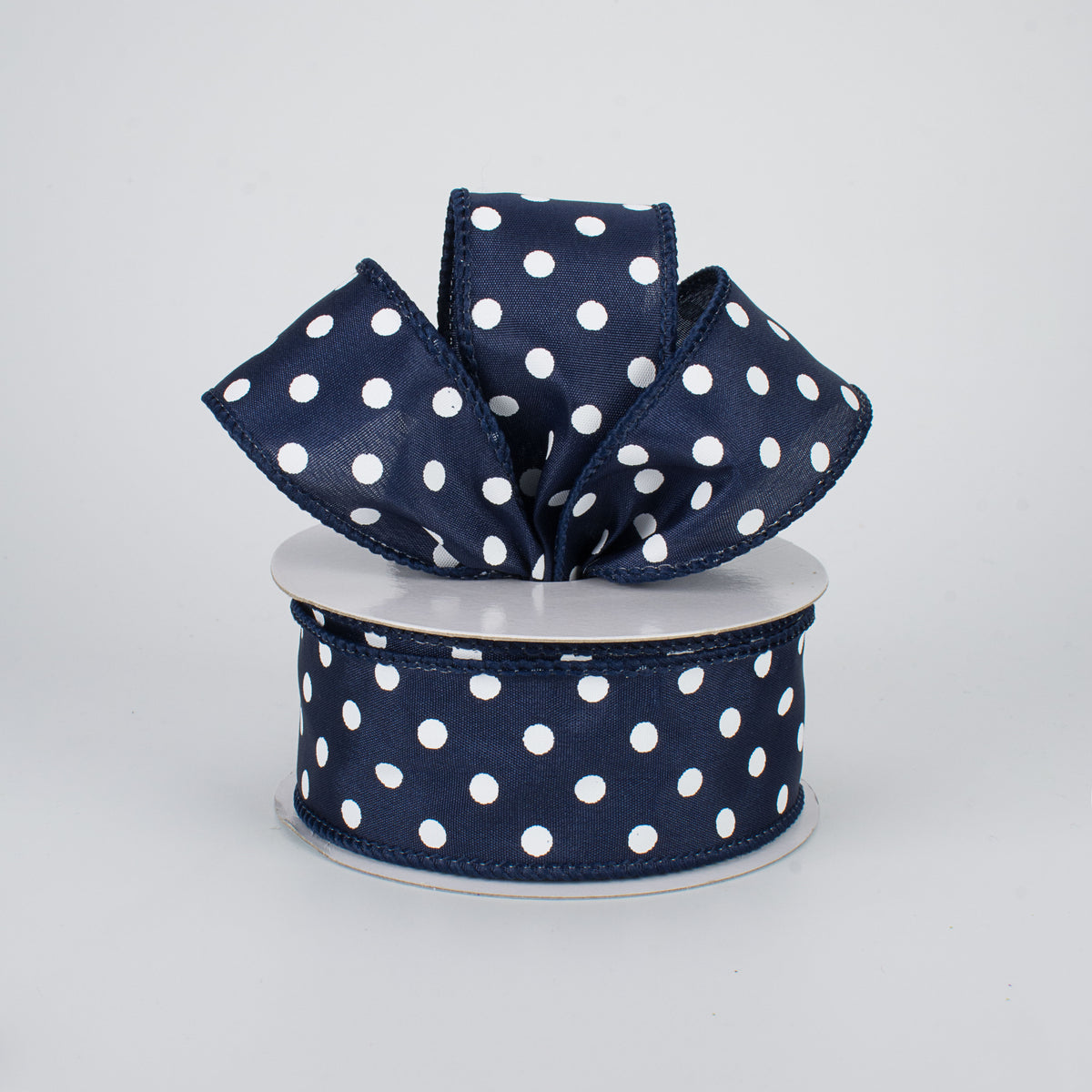 1.5" White Polka Dot Ribbon: Navy Blue (10 Yards) Lifestyle Photo