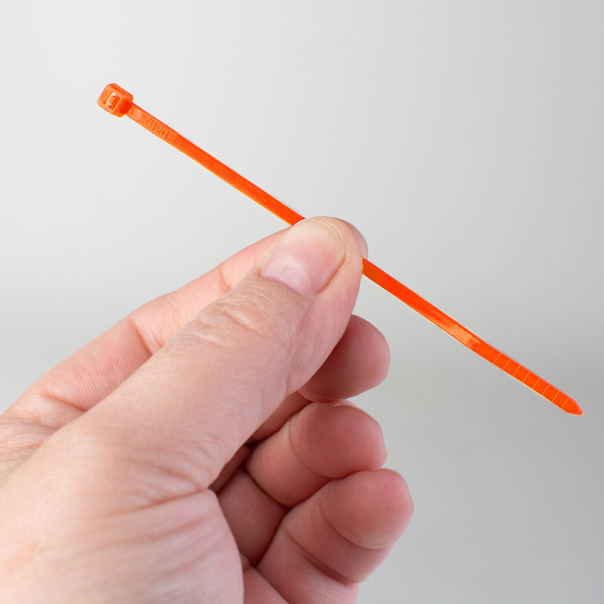4" Zip Tie: Orange (100) Lifestyle Photo