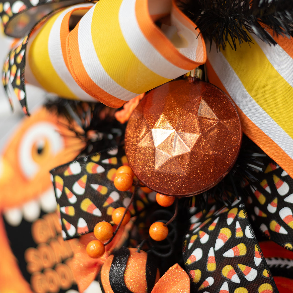 100mm Faceted Flat Round Gem Ornament: Glitter Inside Copper Orange Lifestyle Photo