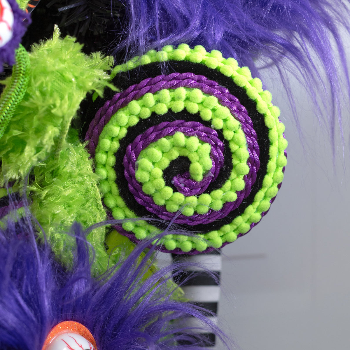 5" x 16" Chenille Pom Pom & Cording Lollipop Spray: Neon Lime, Purple & Black Lifestyle Photo