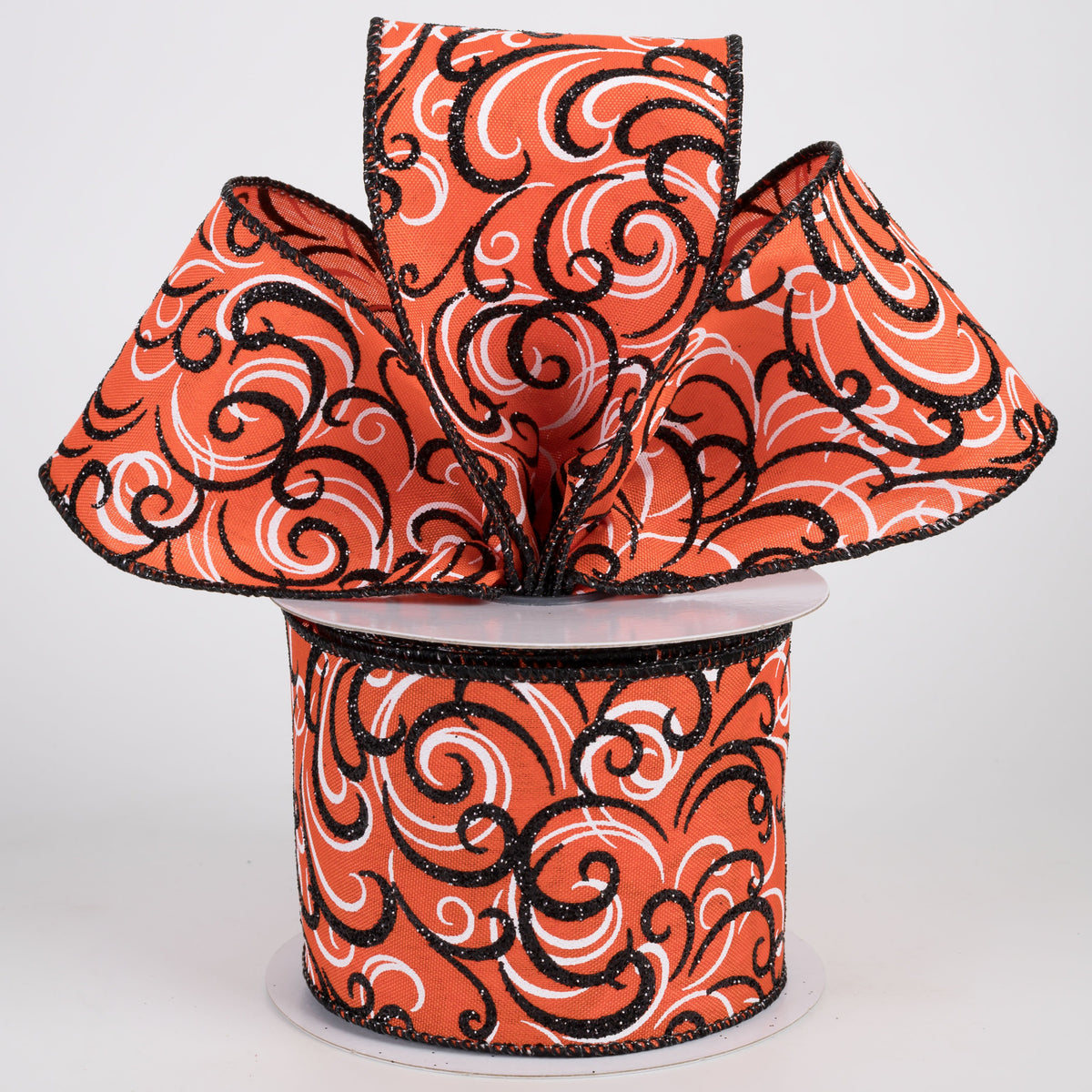 2.5" Glittered Multi Swirls Ribbon: Black & White on Orange (10 Yards) Lifestyle Photo