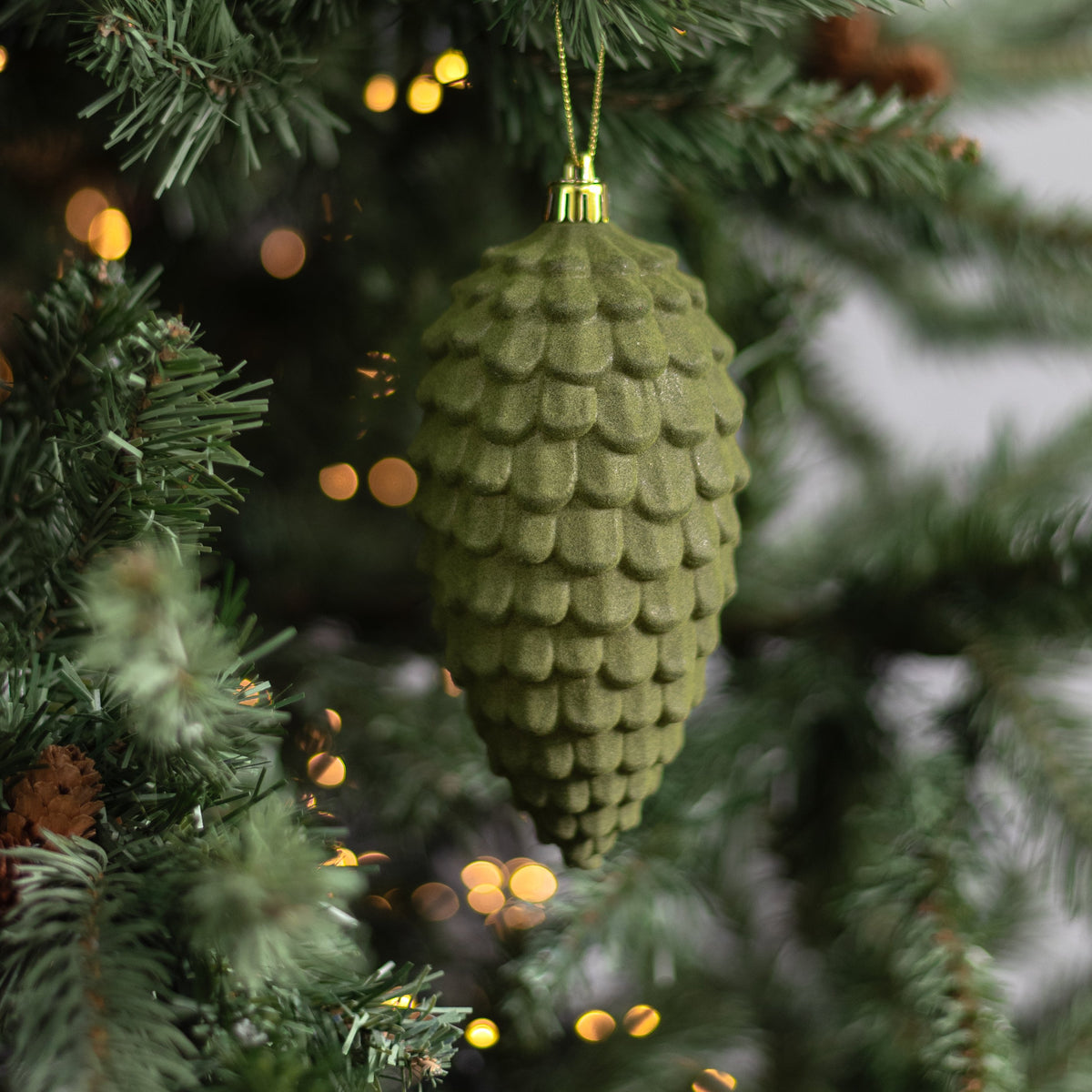 6.5" Flocked Pinecone Ornament: Moss Green Lifestyle Photo