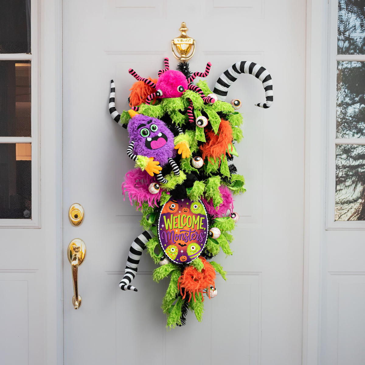 10.5" Oval Waterproof Sign: Furry One-Eyed Halloween Monsters