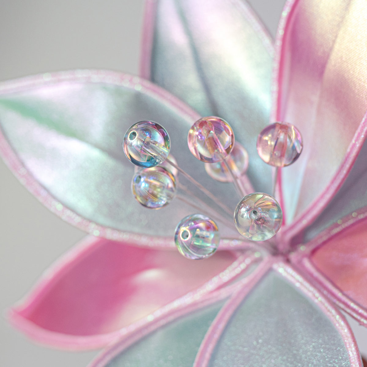 12" x 27" Glossy Iridescent Poinsettia Stem: Mint & Pink