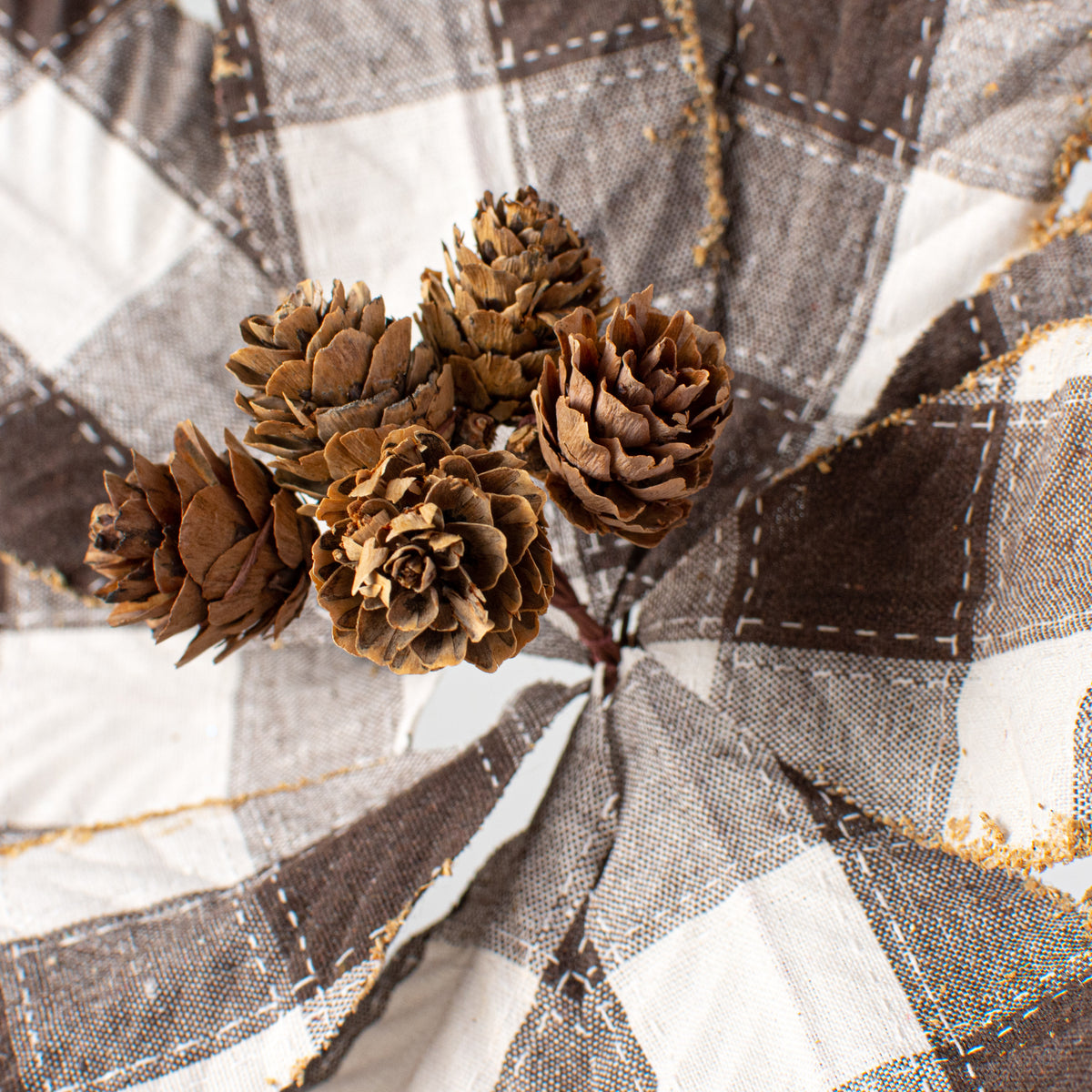 20" Check Poinsettia Stem: Brown & Natural Lifestyle Photo