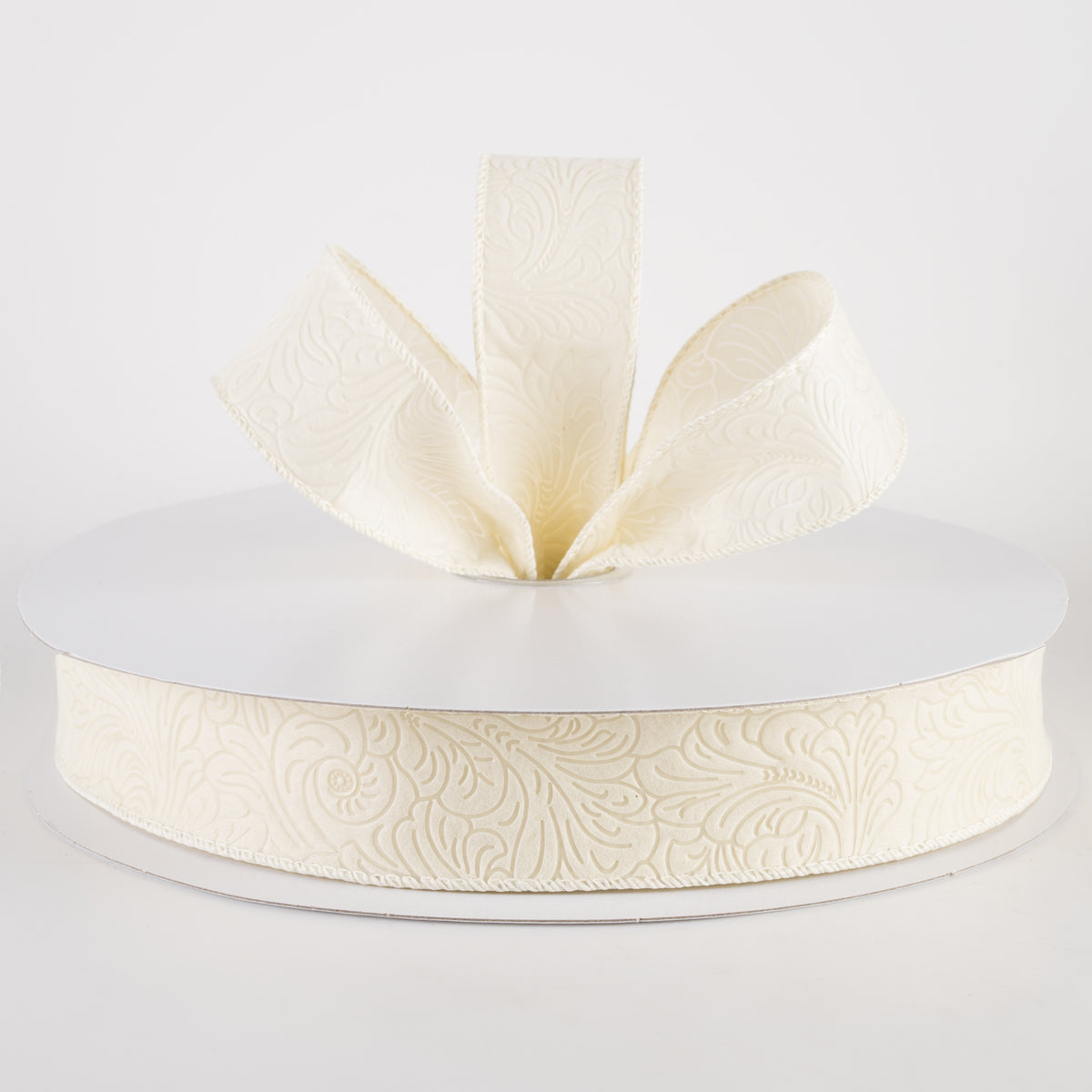 1.5" Embossed Flower Breeze Ribbon: Ivory (50 Yards) Lifestyle Photo