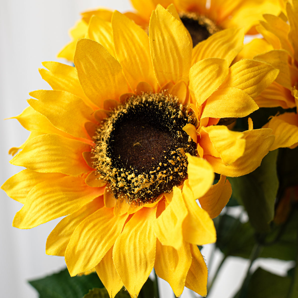 20" Fuzzy Fabric Sunflower Bush: Golden Yellow (5 Stem) Lifestyle Photo