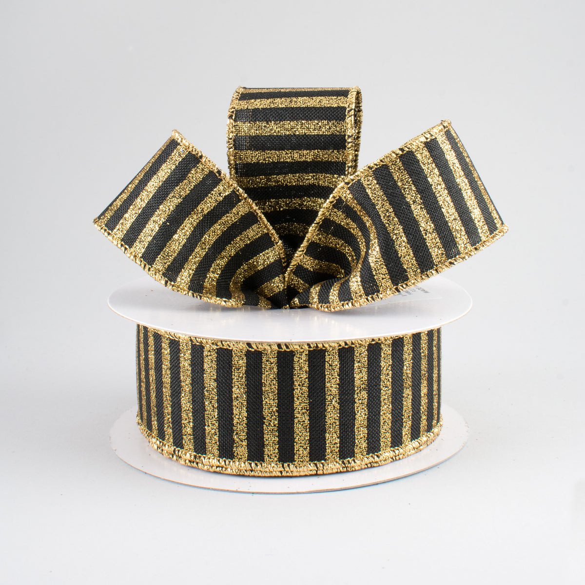 1.5" Glitter Stripe Canvas Ribbon: Black & Gold (10 Yards) Lifestyle Photo
