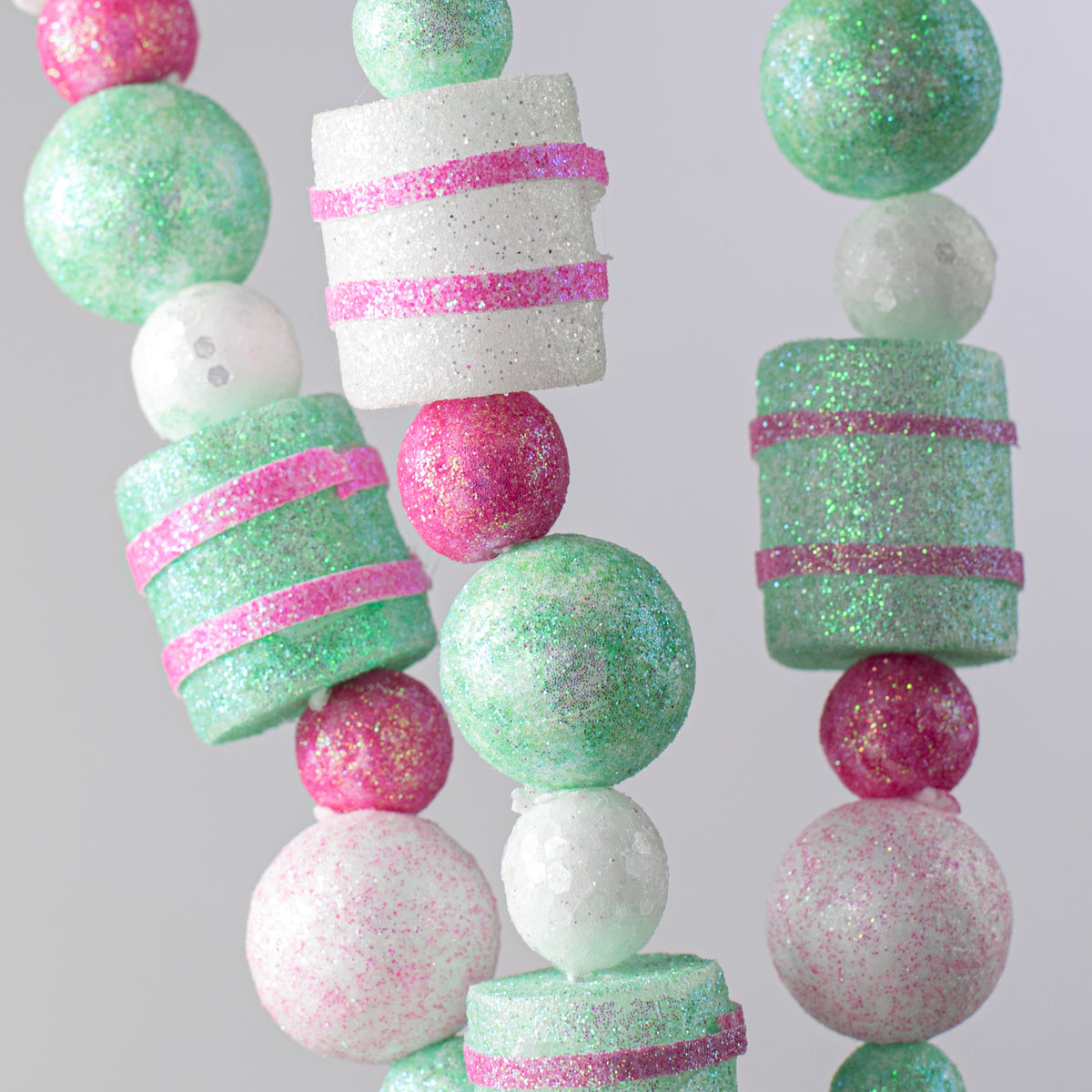 31" Glittered Balls & Striped Cylinders Spray: Pink & Green Lifestyle Photo