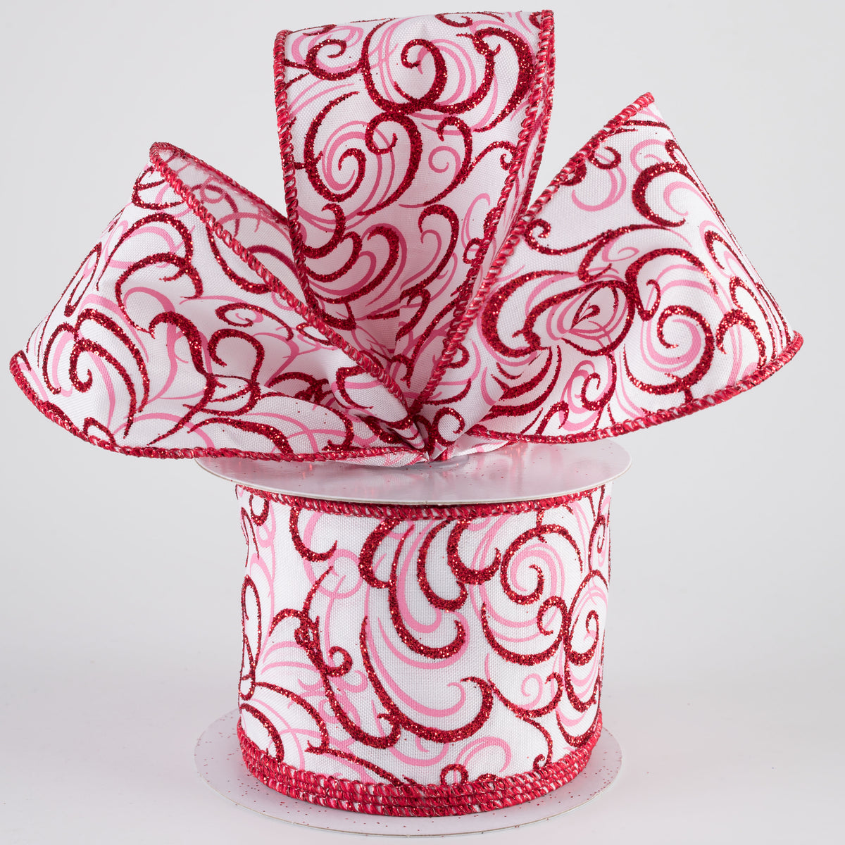 2.5" Glittered Multi Swirls Ribbon: Red & Pink on White (10 Yards) Lifestyle Photo