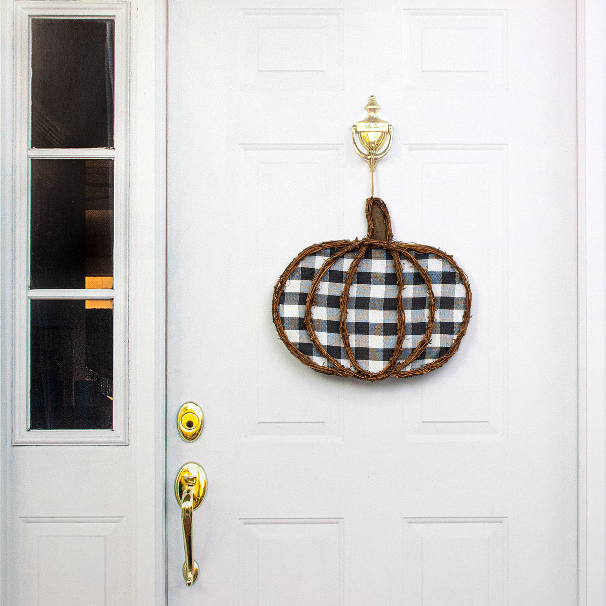 16" Grapevine Hanger: Black & White Check Pumpkin Lifestyle Photo