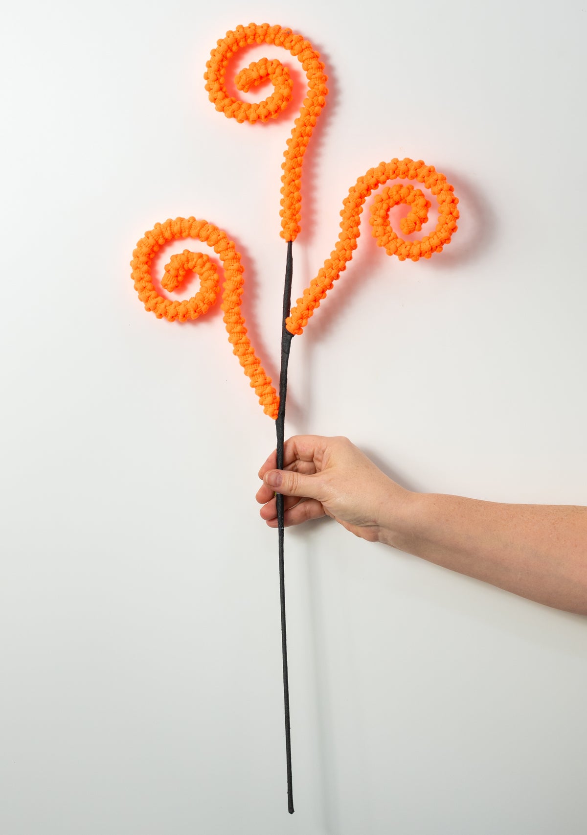 28" Puff Chenille Spiral Curly Spray: Neon Orange on Black