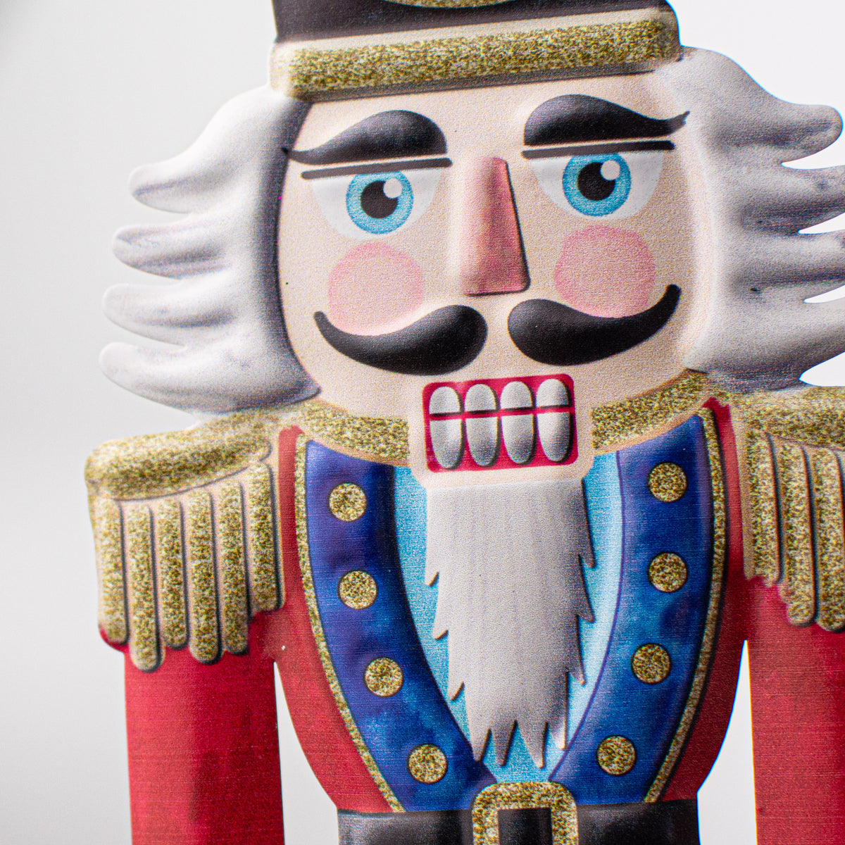 12" Metal Embossed Hanger: Nutcracker detail photo 3